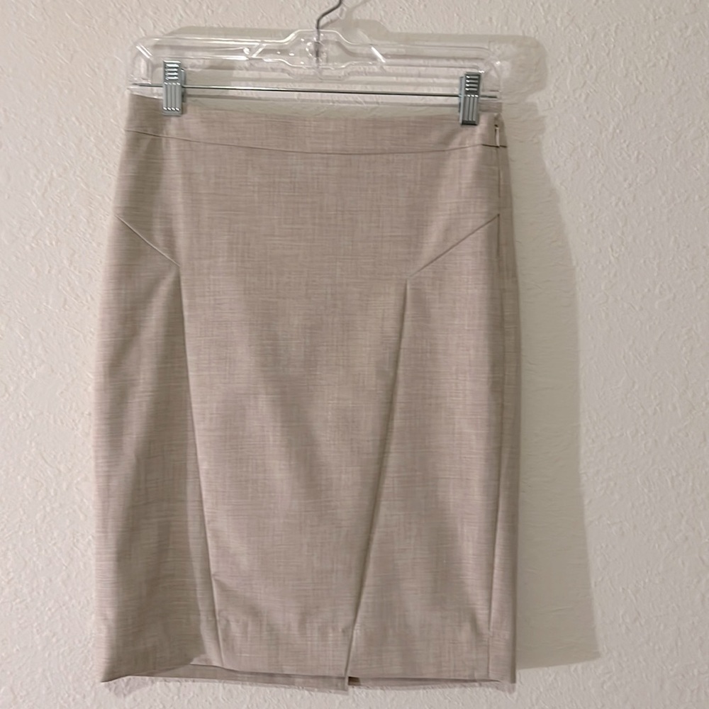 The limited pencil skirt in a beautiful tan color